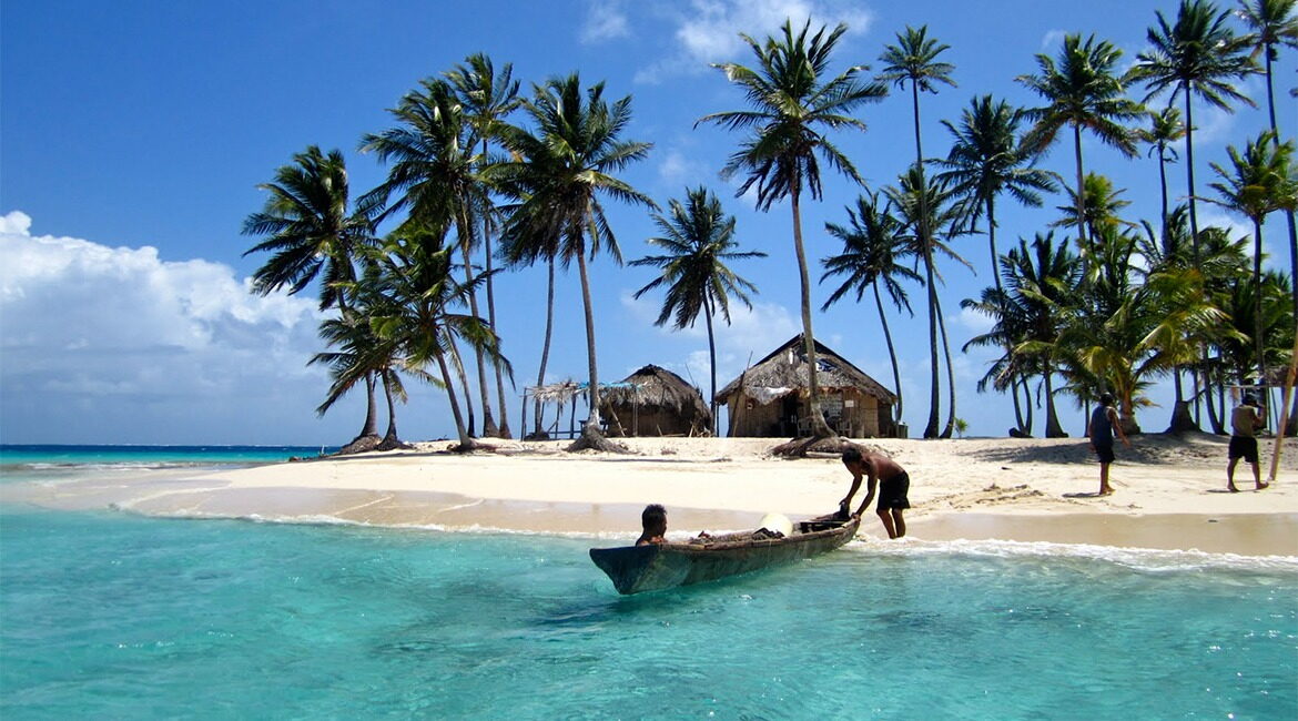 Private boat anchored by a deserted San Blas island
